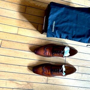 Mans Magnanni dress shoe size 12 British tan brown almost like new.